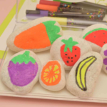 Fruits painting on rocks.