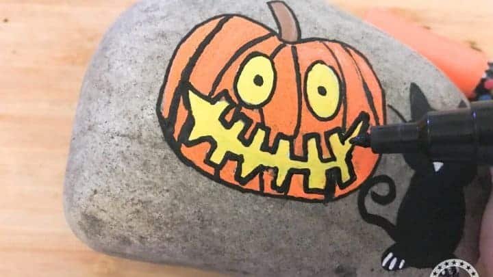 Halloween themed Pumpkin Painted Rocks