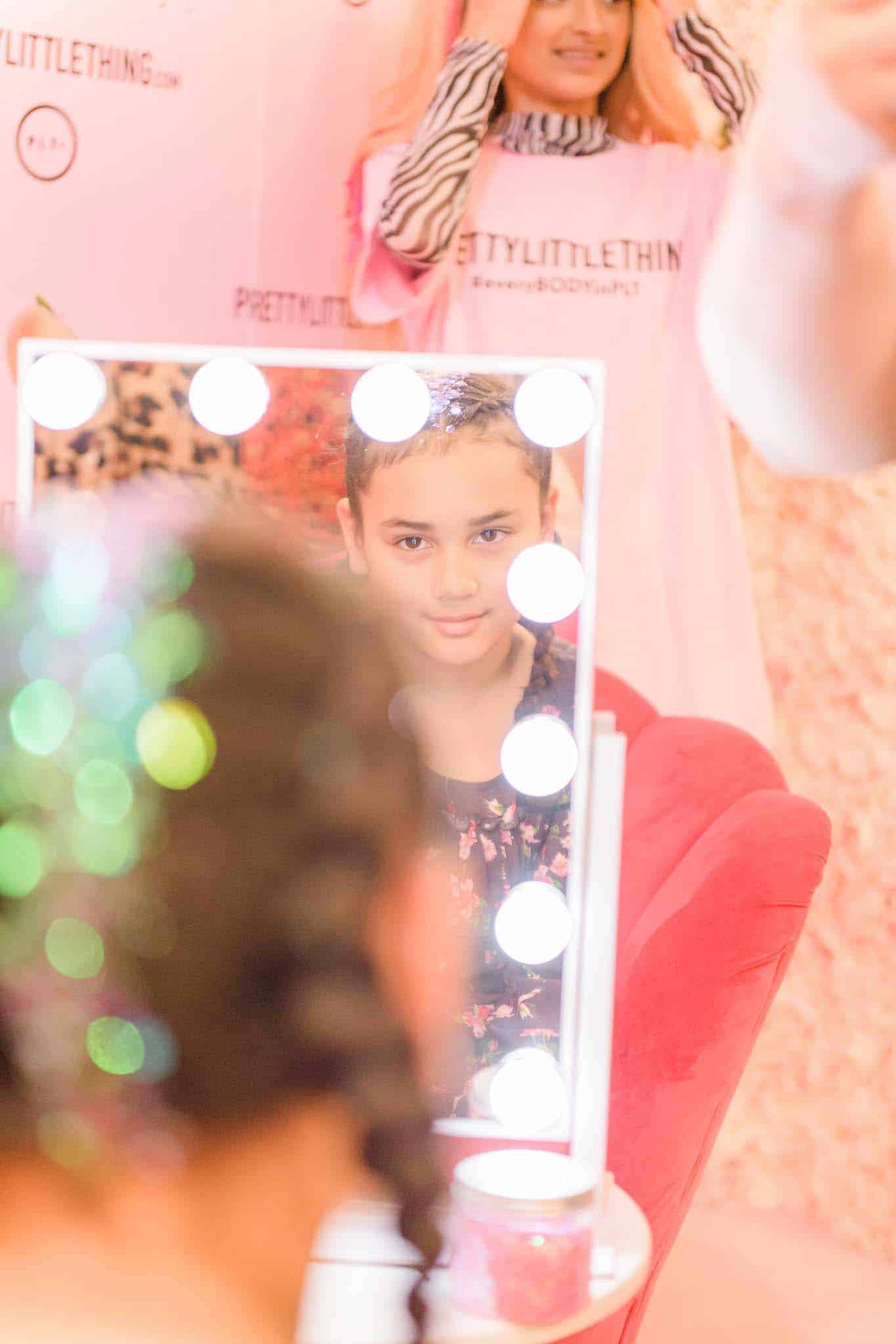 getting our hair braided with pretty little thing
