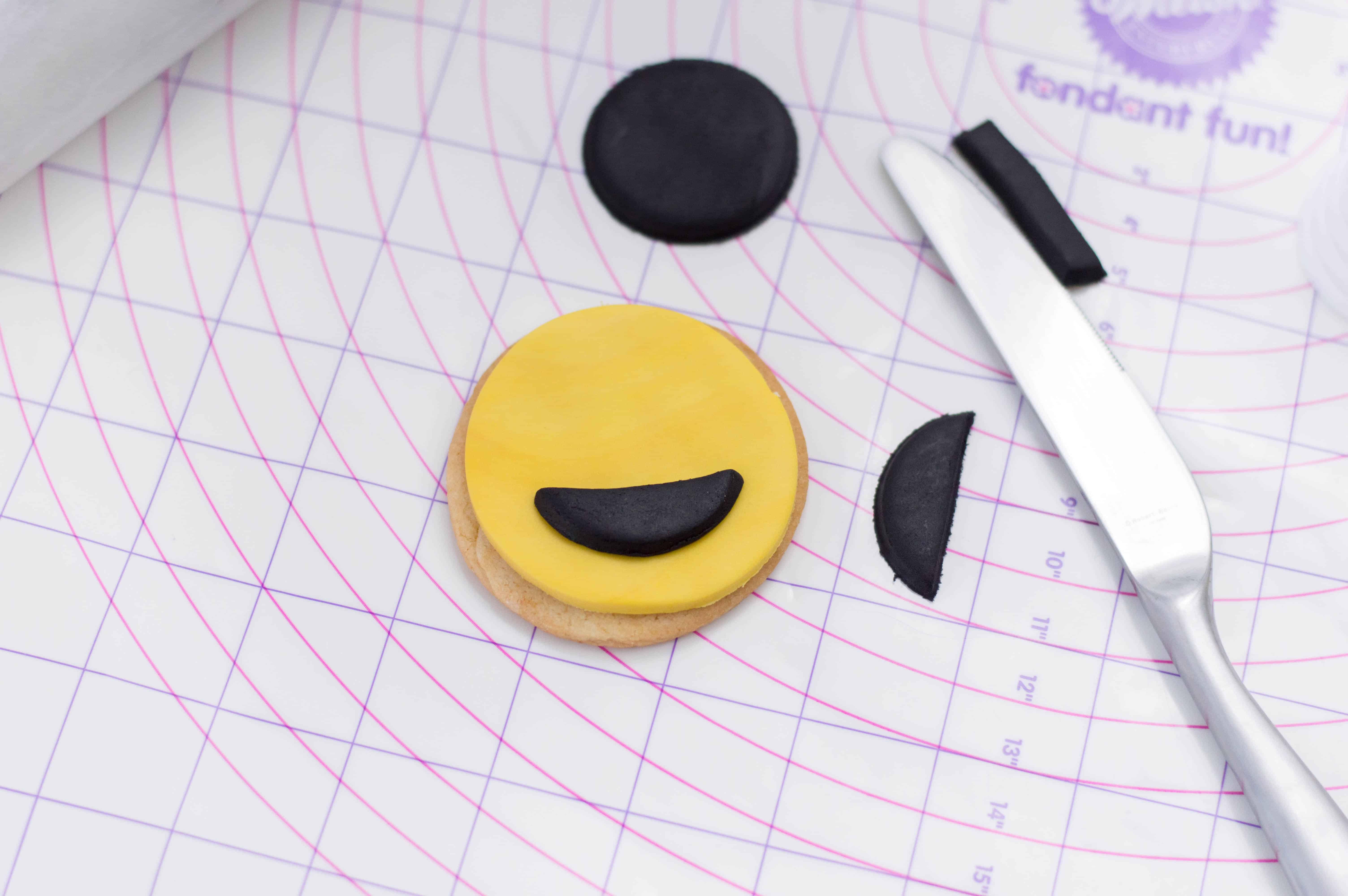 Smiley faced cookie.