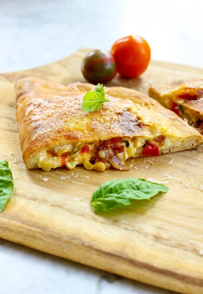 Corn, Tomatoes, And Bacon Calzone.