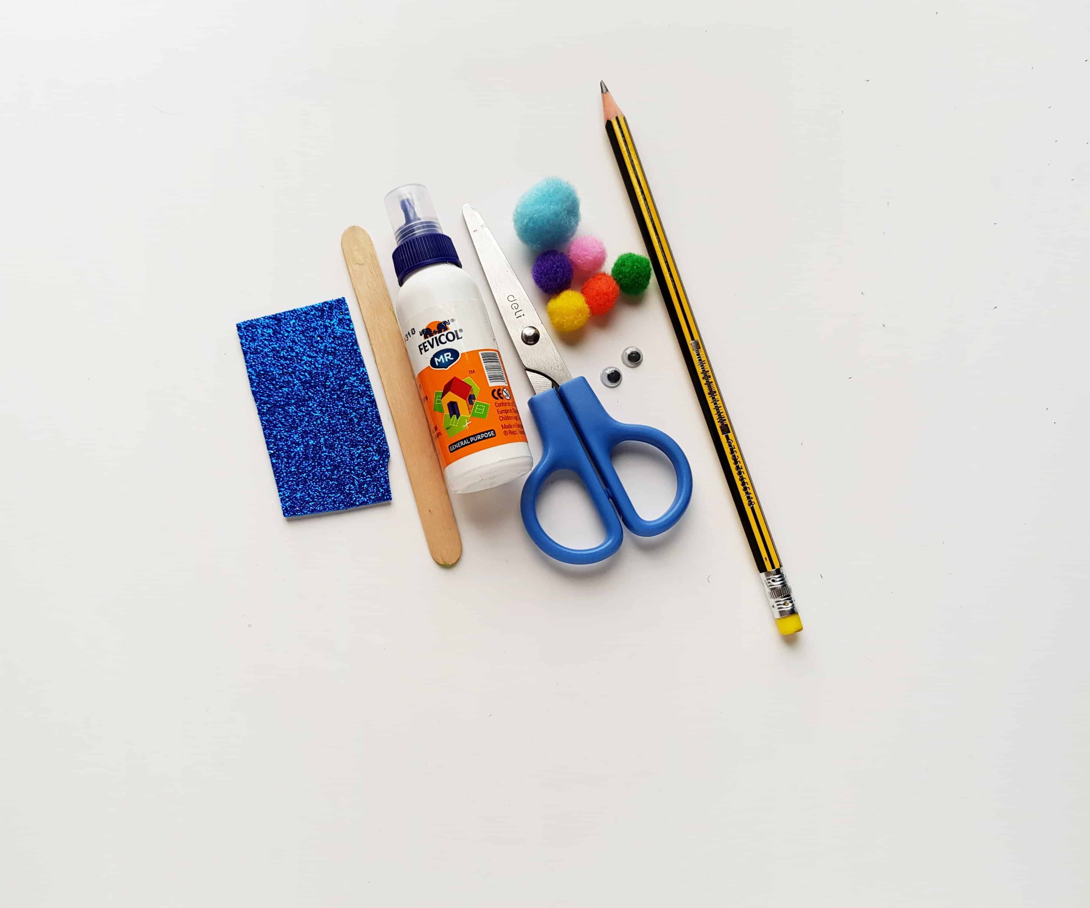 Supplies for Making a Dragonfly Craft to Teach Kids About Insects.