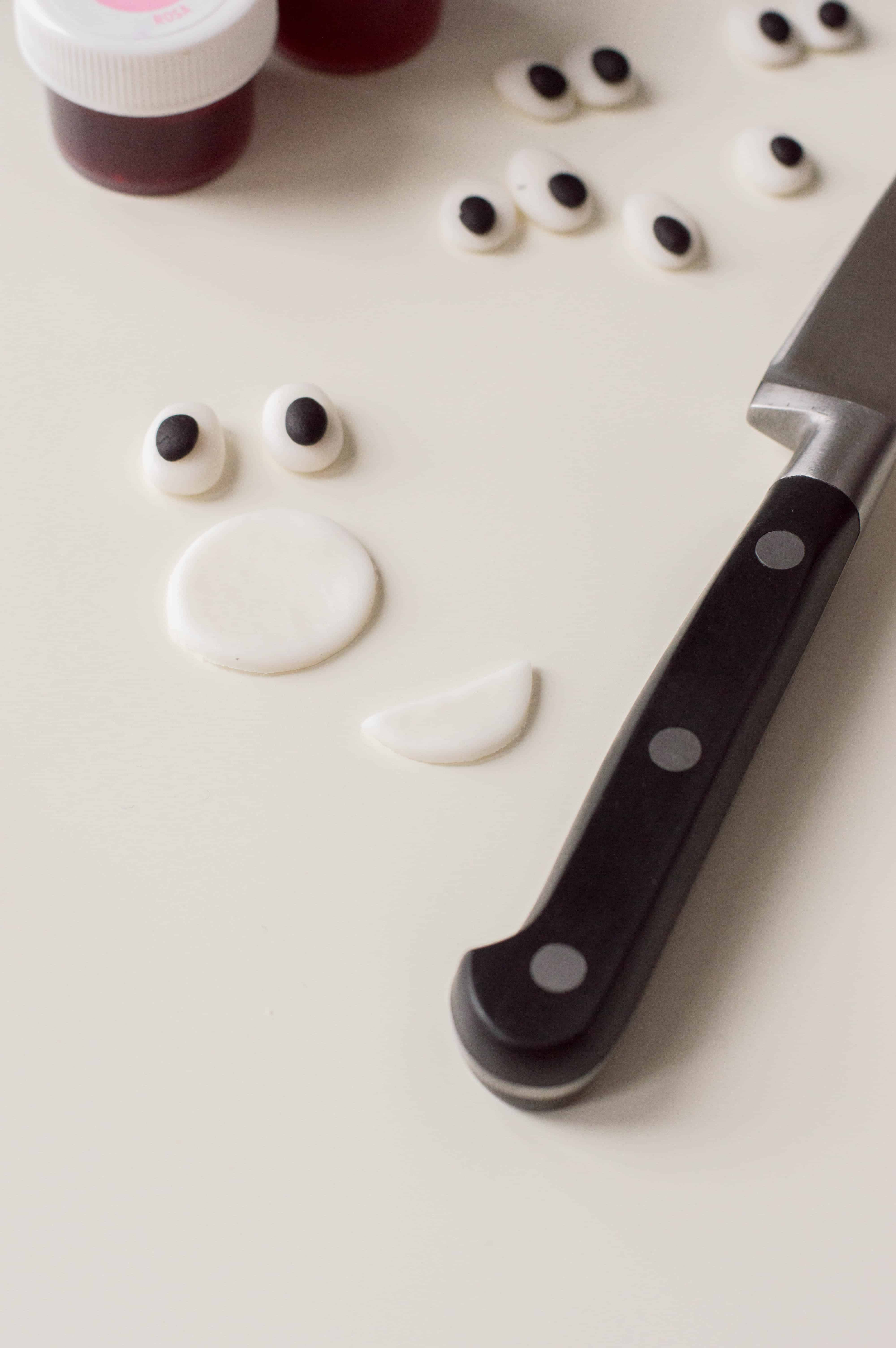 Making Fondant Eyes for Emoji Cupcakes.