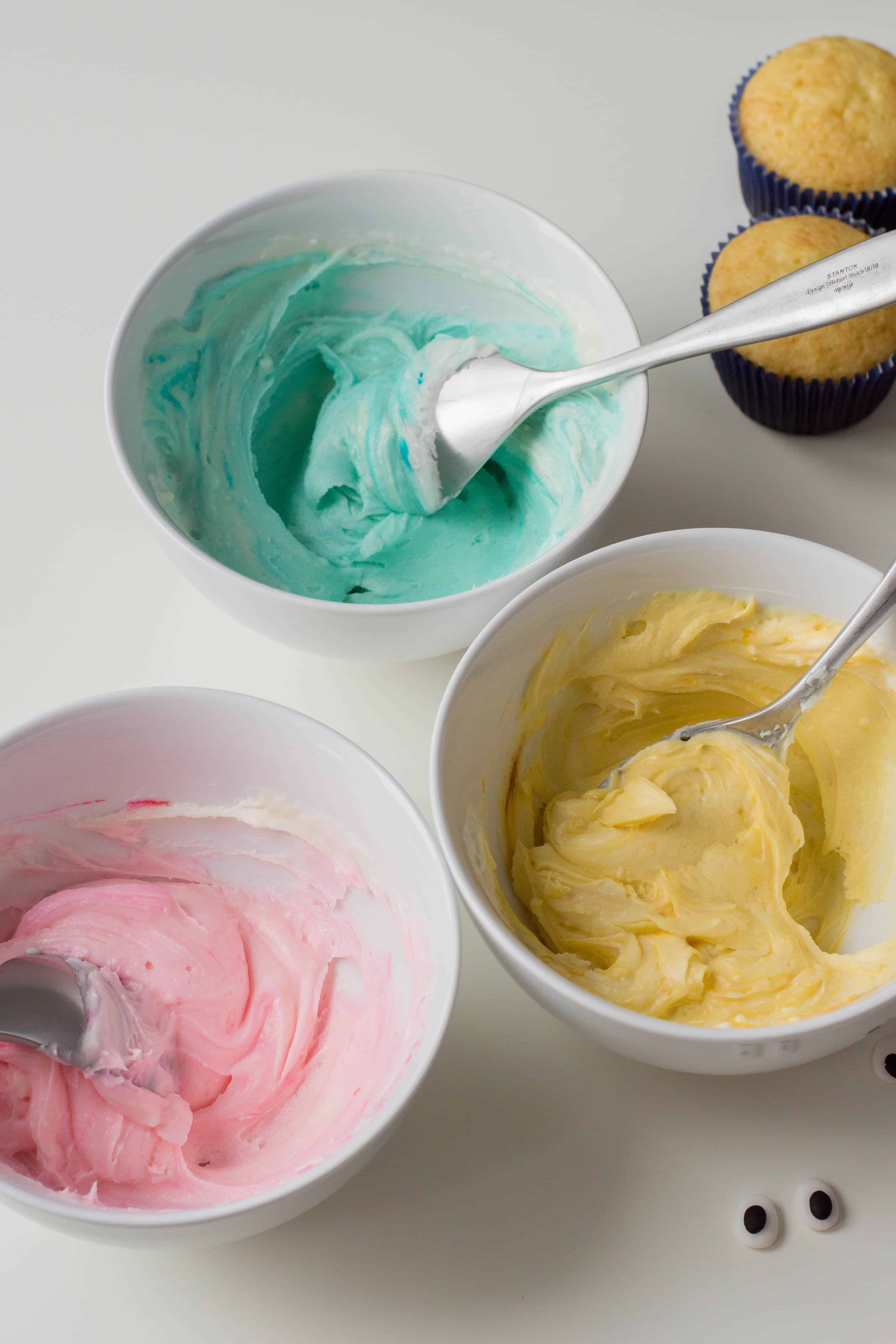 How to Make Tie-Dye Icing Emoji Cupcakes.