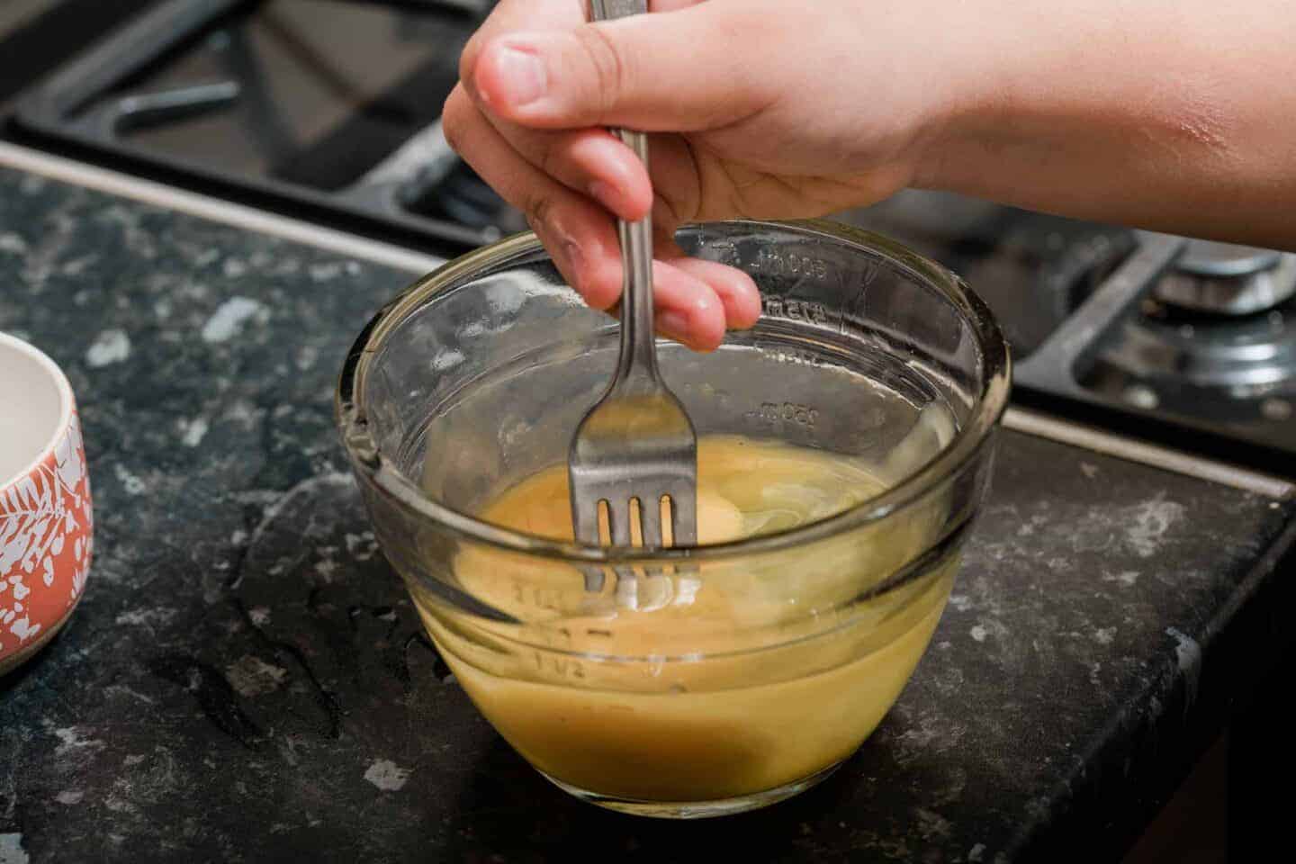 Mixing Eggs For Japanese Omelette.