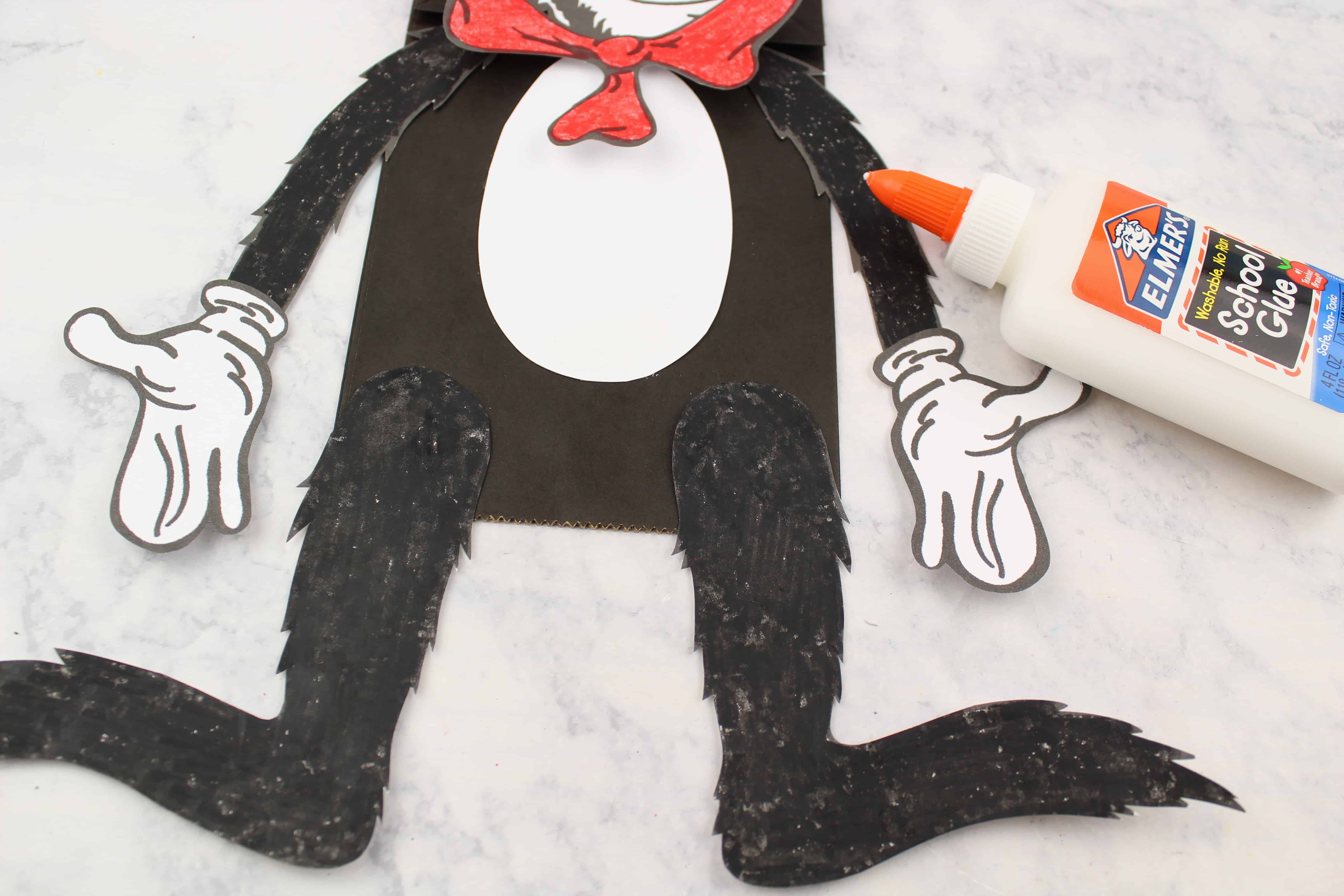 cat in the hat preschool puppet adding legs to the cat