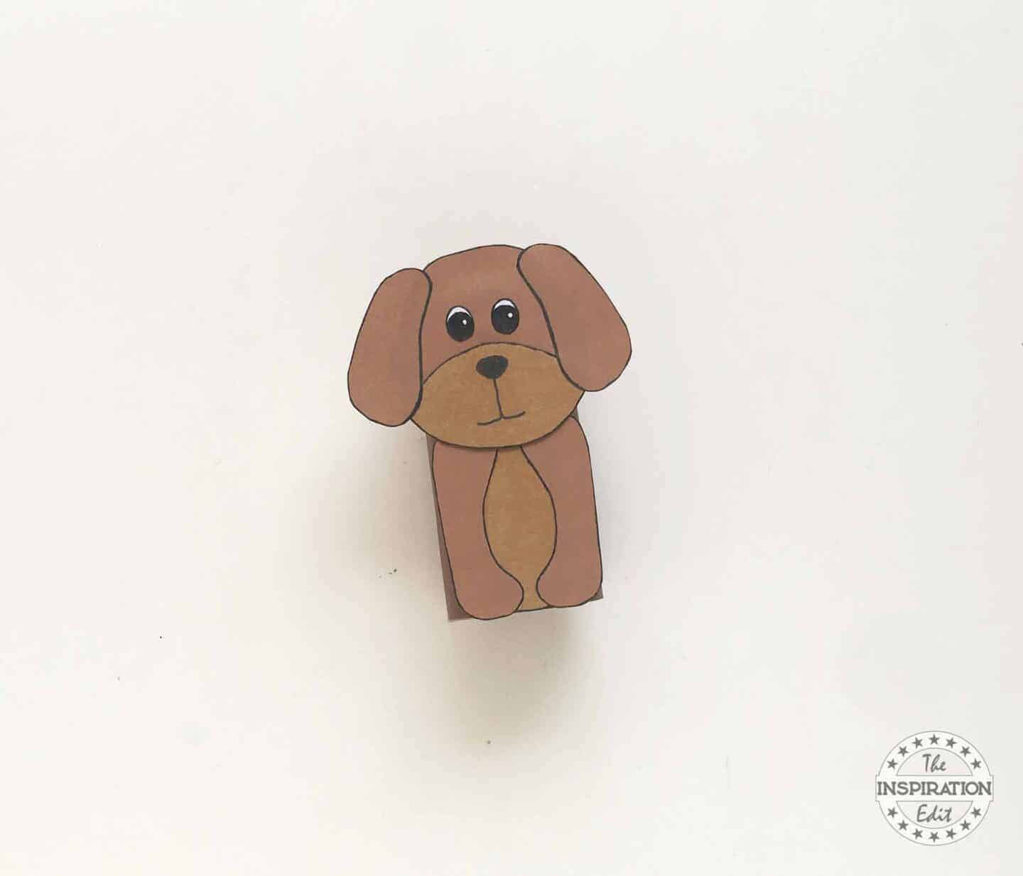 Dog Head Attached to Tissue Paper Roll with Feet.