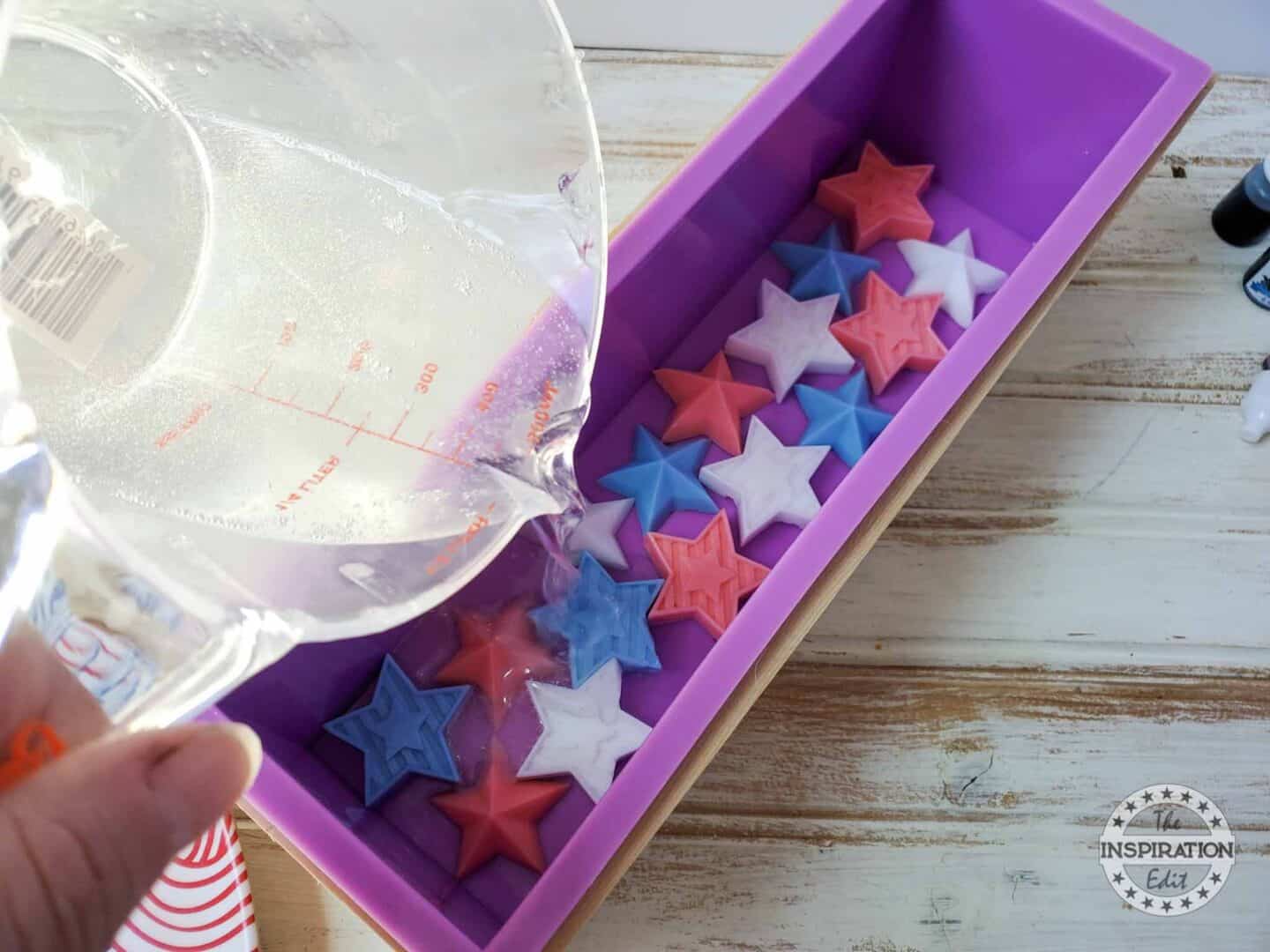 Measuring Cup, Clear Glycerin Soap, and Various Colors of Soap in Loaf Soap Mold.