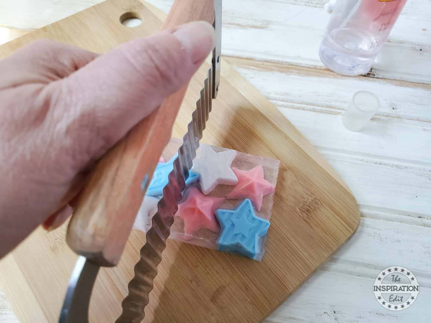 Various Colors of Soap and Soap Cutter.
