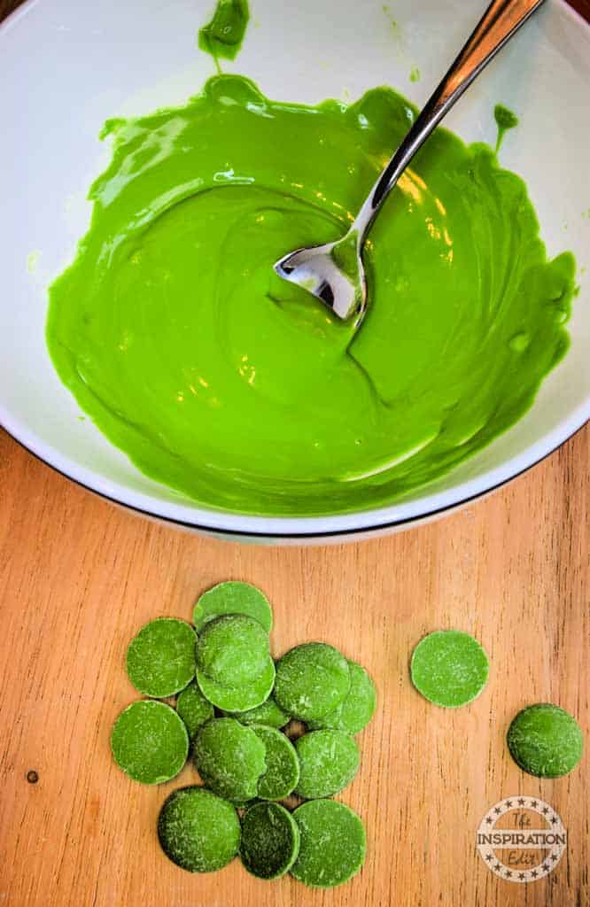 Green melted wafers in a bowl.