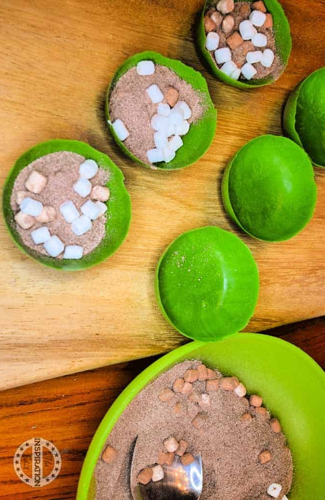 Preparing cocoa bombs.