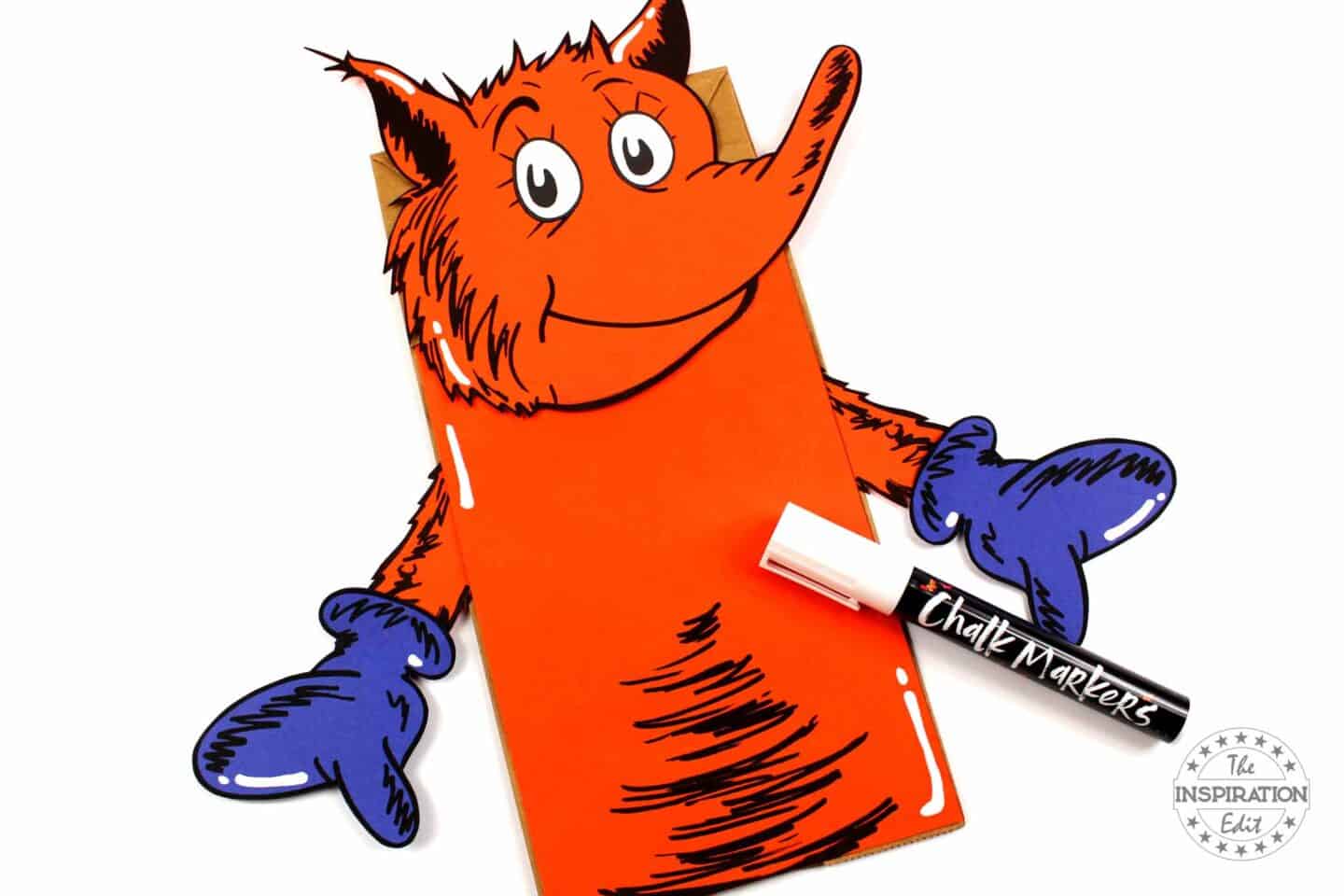 draw with chalk marker on fox in socks paper bag puppet