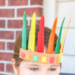 A girl wearing native American headband.