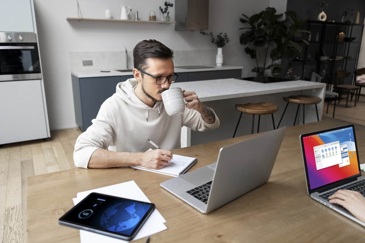 Run A Business From Home | Woman Looking At Her Business Emails On Her Device.