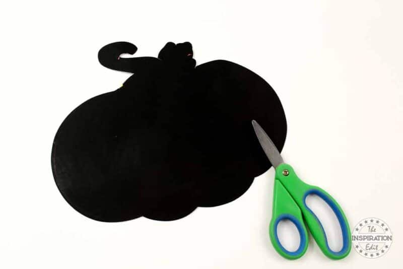Cutting Out the Black Template.