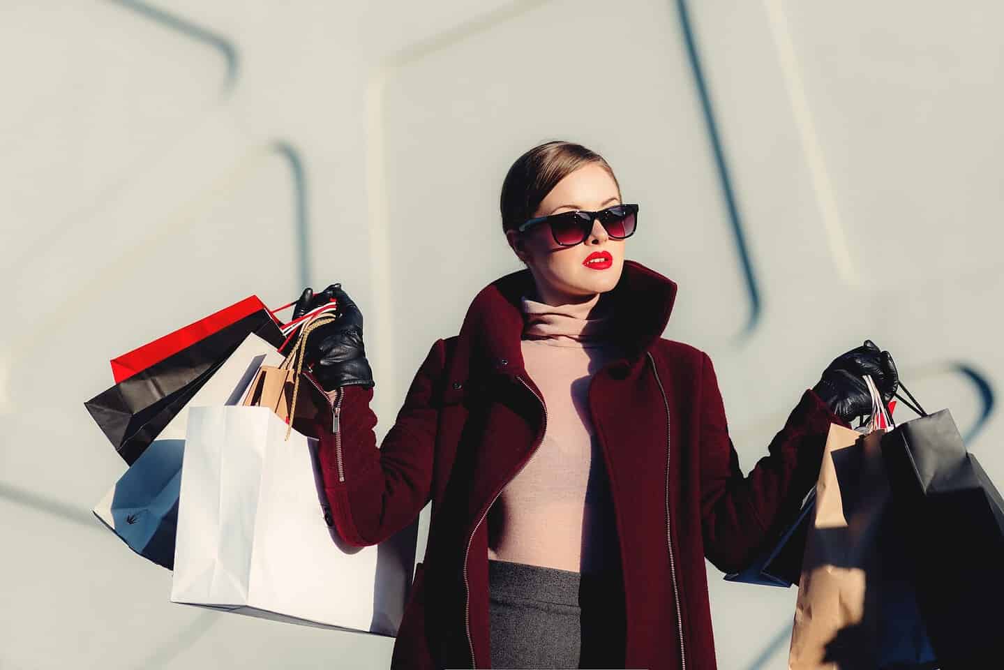 Stay Up To Date With New Fashion Trends | Woman who has just purchased new clothes.