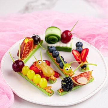 fruit & vegetable bugs on a white plate.